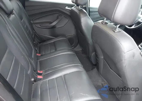 2016 Ford Escape Titanium z USA, uszkodzony, nr VIN 1FMCU9J92GUC33797